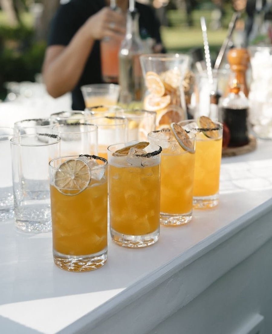 Row of finished cocktails ready to serve
