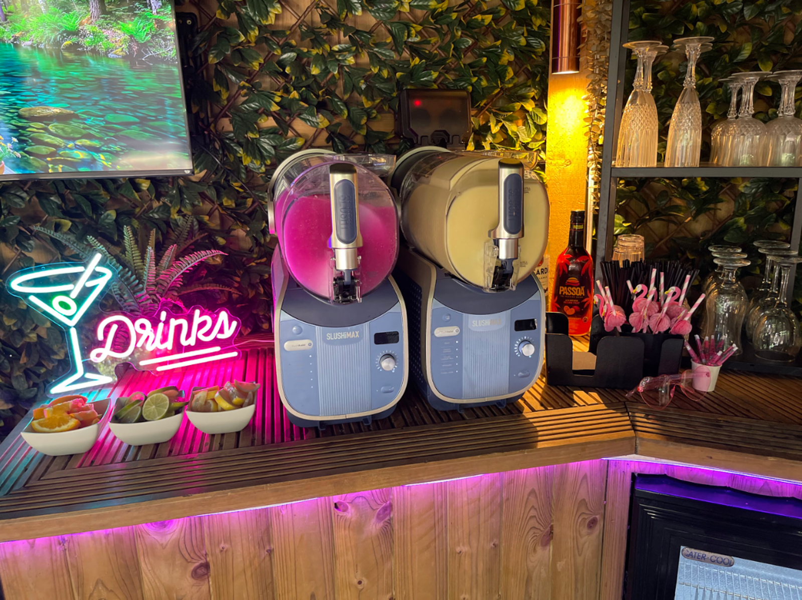 Self-serve frozen cocktail bar setup with two Slushimax machines